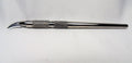 Seam ripper with replaceable blades, round handle